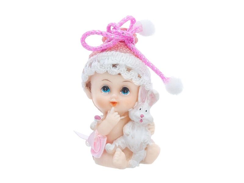 Figurine fille avec lapin rose