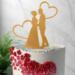 Goldener Cake Topper Brautpaar mit Herzen